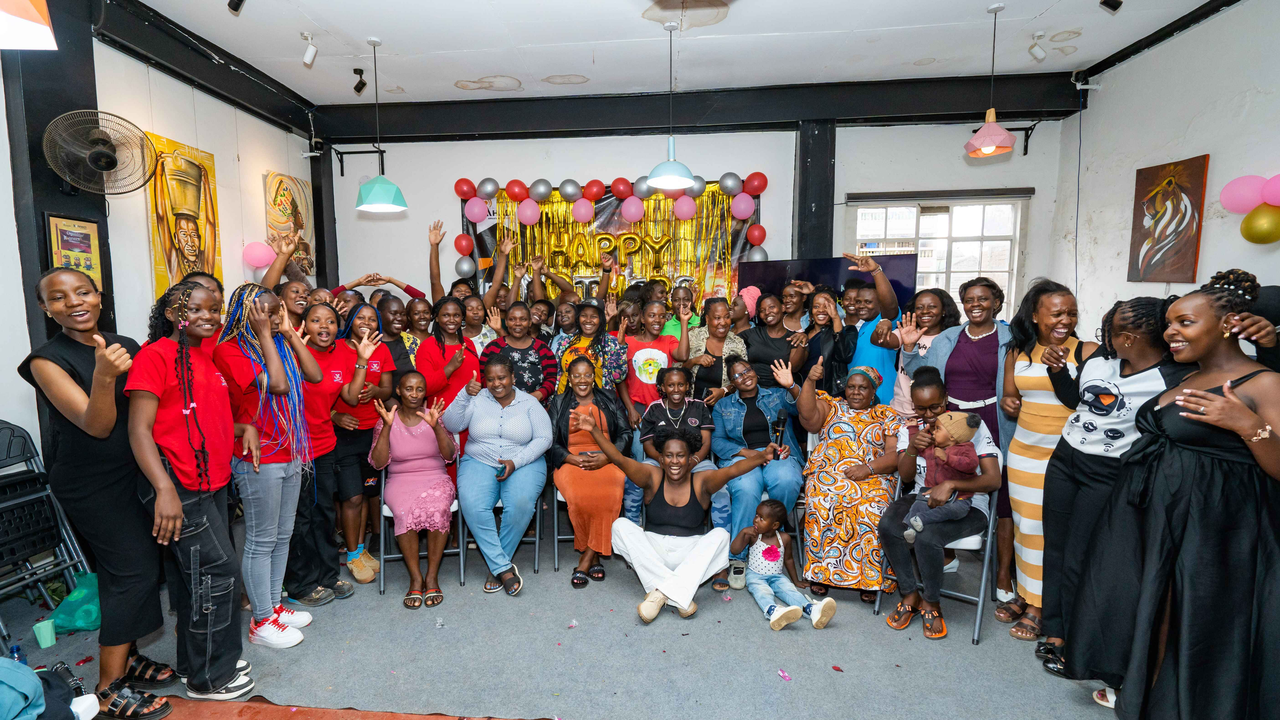 Group photo of all mothers, staff and partners